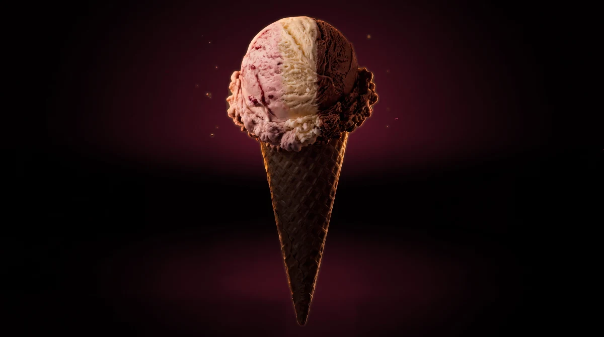 Neapolitan ice cream cone with a pink glow